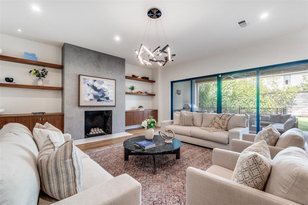 5111 West Amherst Avenue Dallas, TX 75209 - Photo 8 of 36 a living room with furniture fireplace and a large window