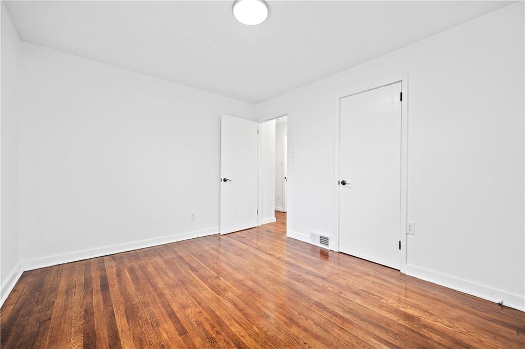 63 Herbst Road Coraopolis, PA 15108 - Photo 3 of 19 a view of an empty room with wooden floor