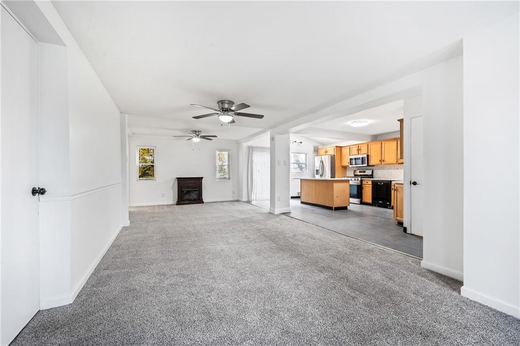 63 Herbst Road Coraopolis, PA 15108 - Photo 5 of 19 a view of a livingroom with a kitchen