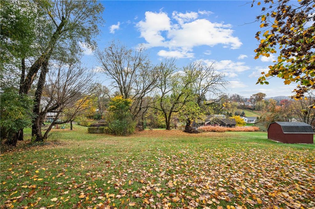63 Herbst Road Coraopolis, PA 15108 - Photo 10 of 19 a view of a garden with a bench