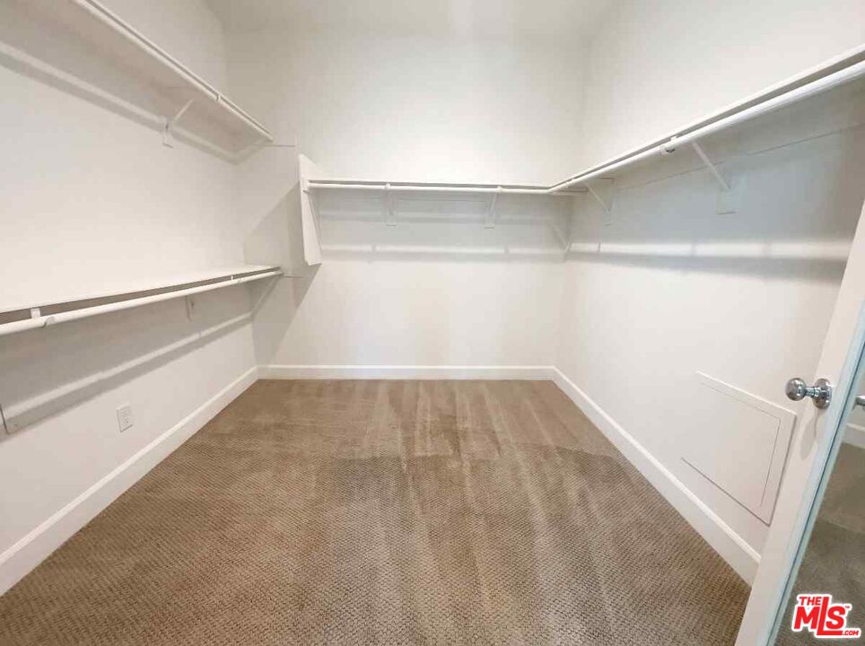 264 Rose Street Fillmore, CA 93015 - Photo 19 of 24 a view of an empty walk in closet