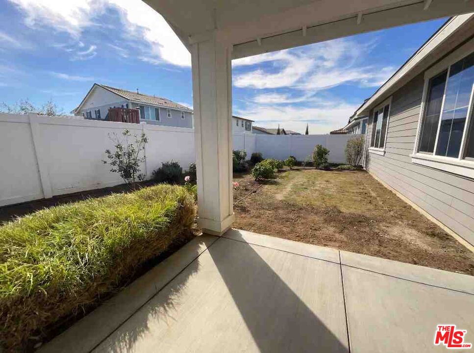 264 Rose Street Fillmore, CA 93015 - Photo 20 of 24 a view of a back yard from a balcony