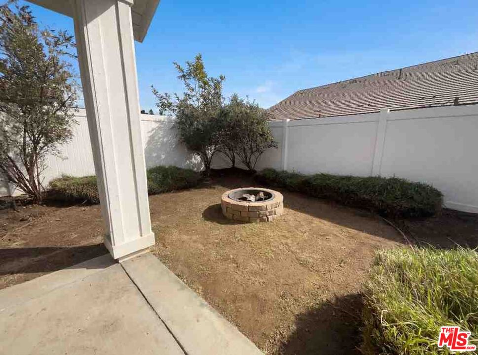 264 Rose Street Fillmore, CA 93015 - Photo 21 of 24 a view of a backyard with plants and trees