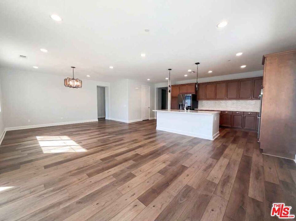 264 Rose Street Fillmore, CA 93015 - Photo 3 of 24 a view of kitchen and wooden floor