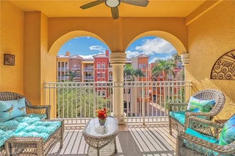 a view of swimming pool with outdoor seating