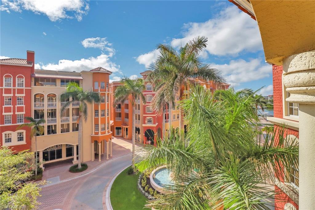 410 Bayfront Place, Unit 2407 Naples, FL 34102 - Photo 19 of 30 a bathroom with a sink and mirror