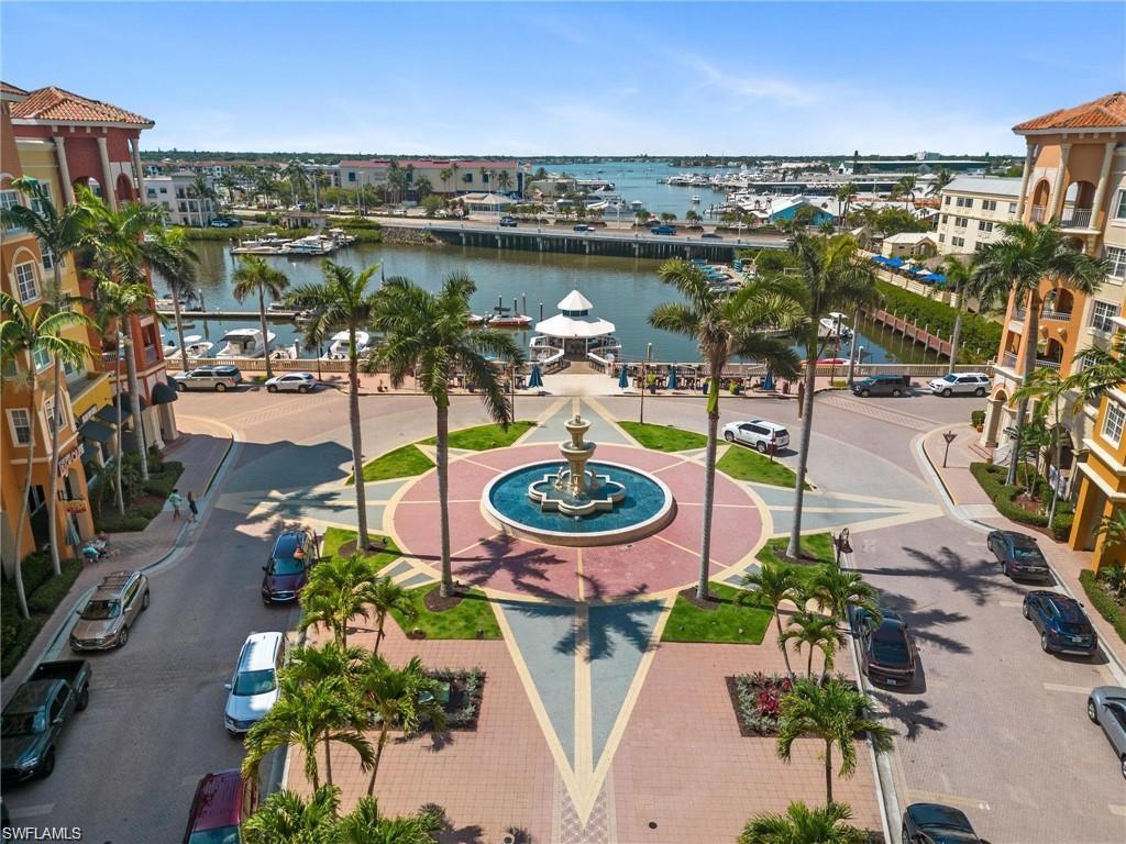 410 Bayfront Place, Unit 2407 Naples, FL 34102 - Photo 30 of 30 an aerial view of a house with outdoor space and a lake view in back