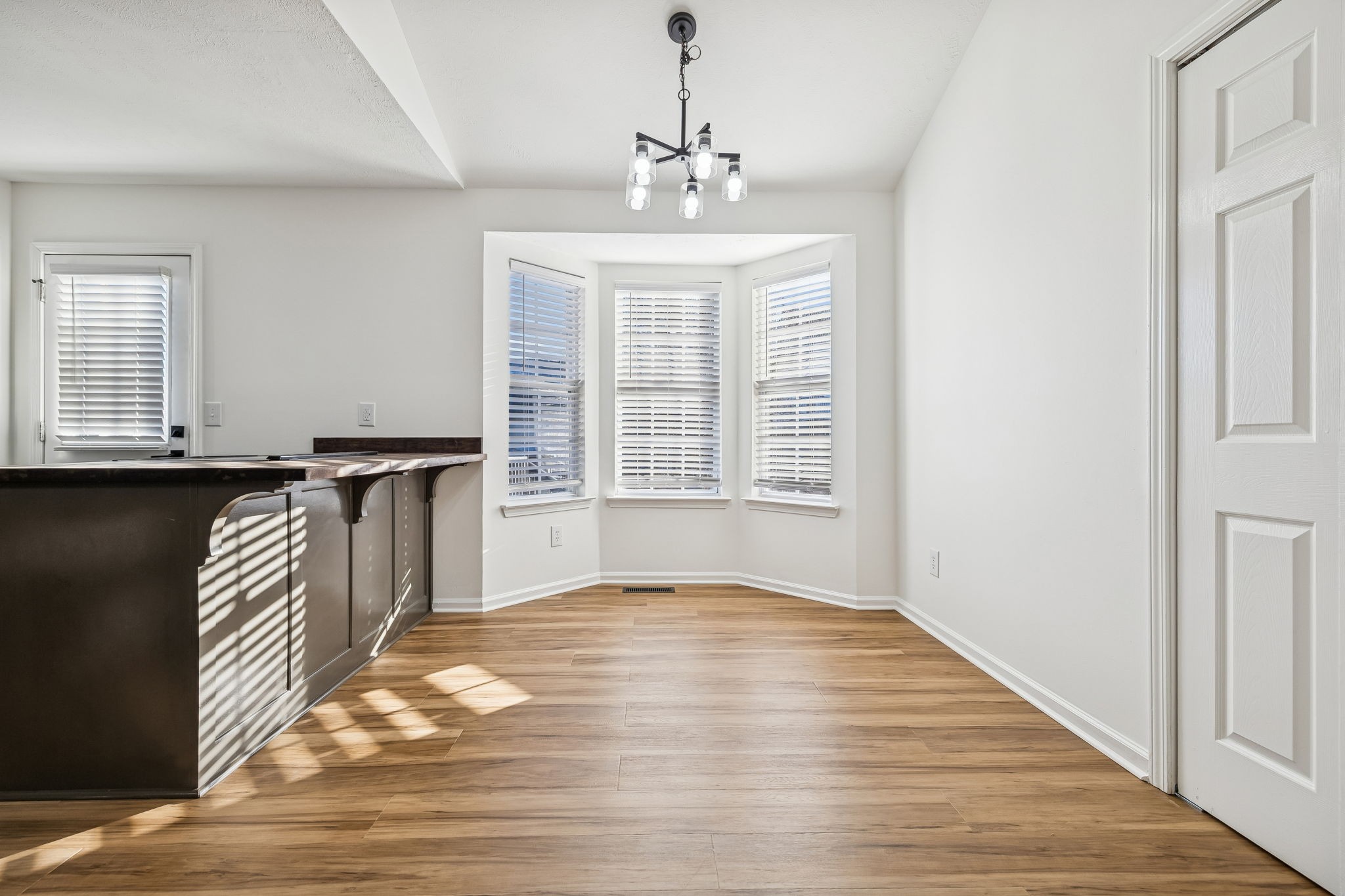 803 Pebble Point Mount Juliet, TN 37122 - Photo 18 of 39 a view of an empty room with wooden floor and a window
