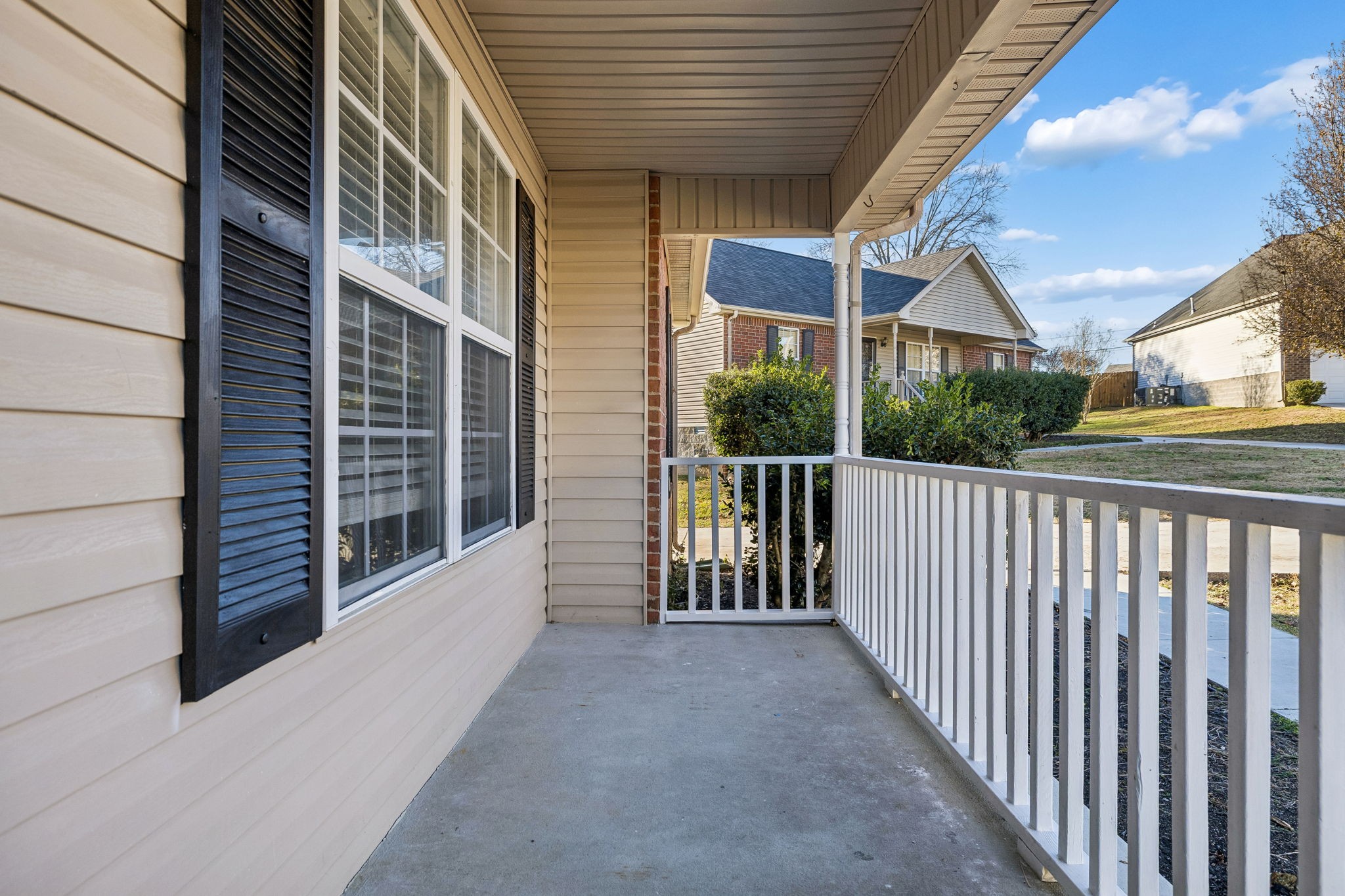 803 Pebble Point Mount Juliet, TN 37122 - Photo 5 of 39 a view of a brick house with a large window