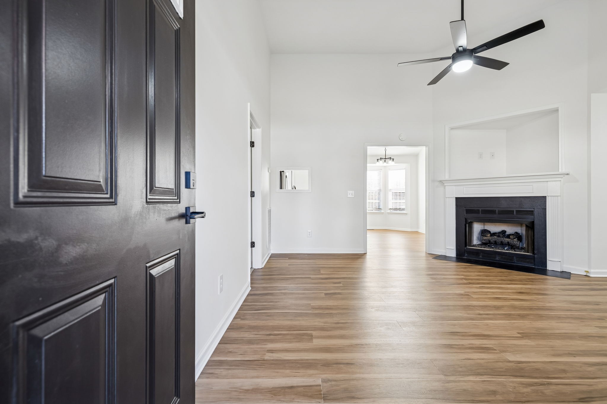 803 Pebble Point Mount Juliet, TN 37122 - Photo 6 of 39 a view of an empty room with window and fireplace