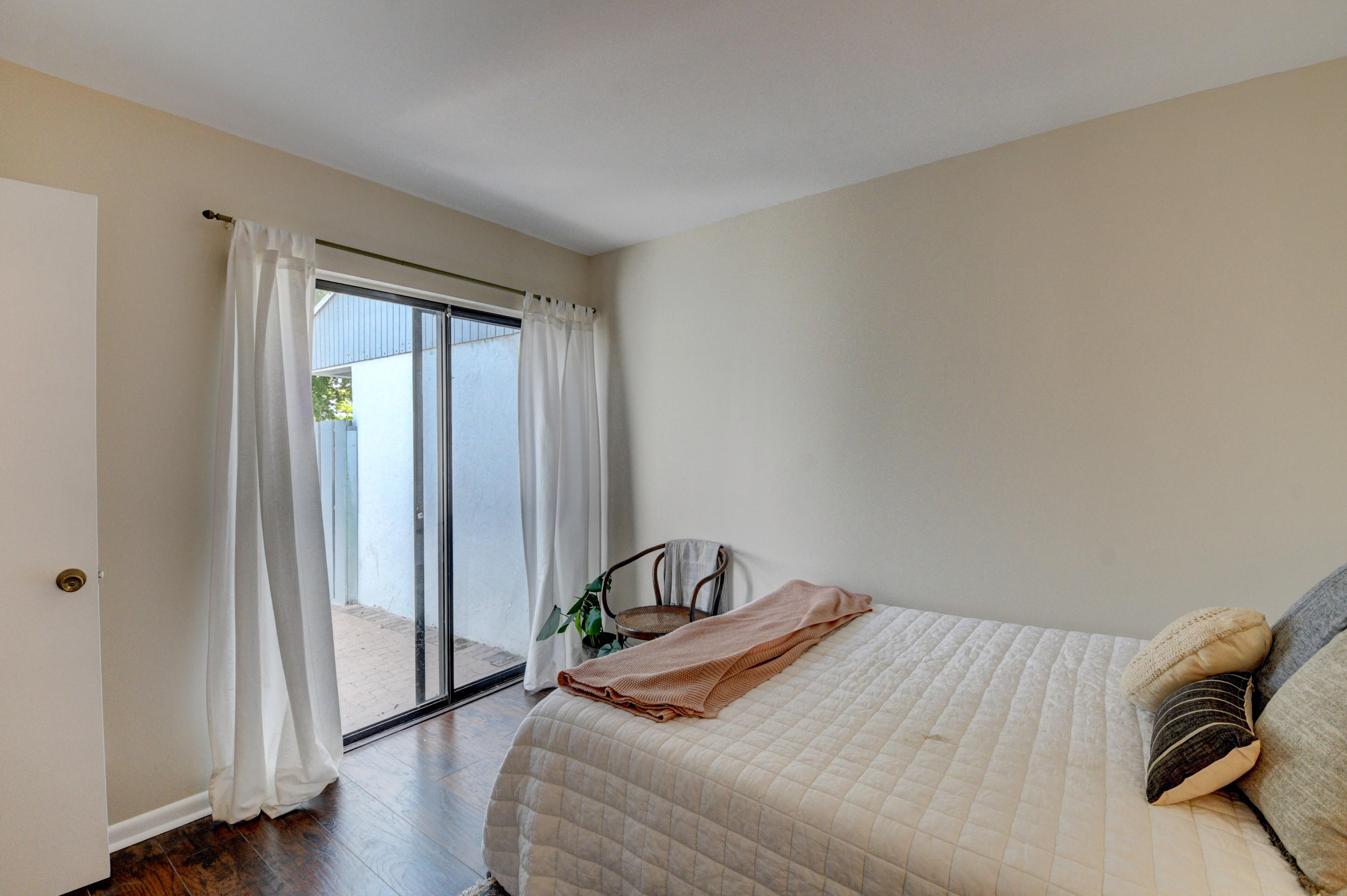 235 Northwest 15th Street Boca Raton, FL 33432 - Photo 15 of 32 a bedroom with a bed and a window