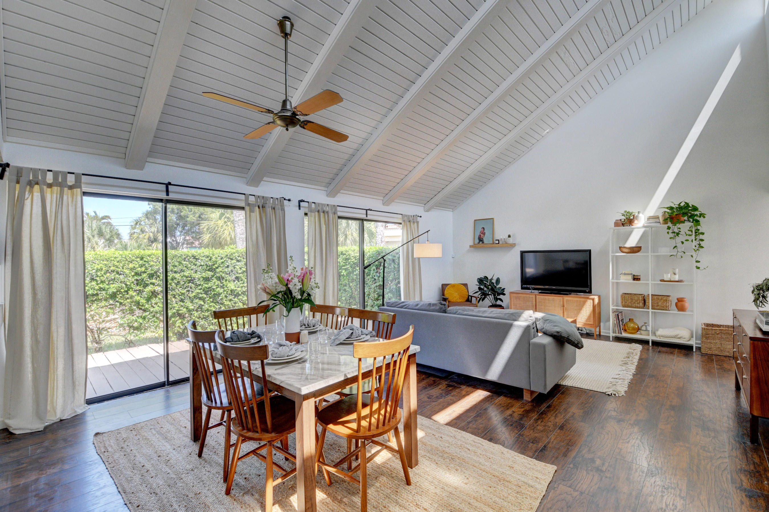 235 Northwest 15th Street Boca Raton, FL 33432 - Photo 4 of 32 a view of a dining room with furniture window and wooden floor