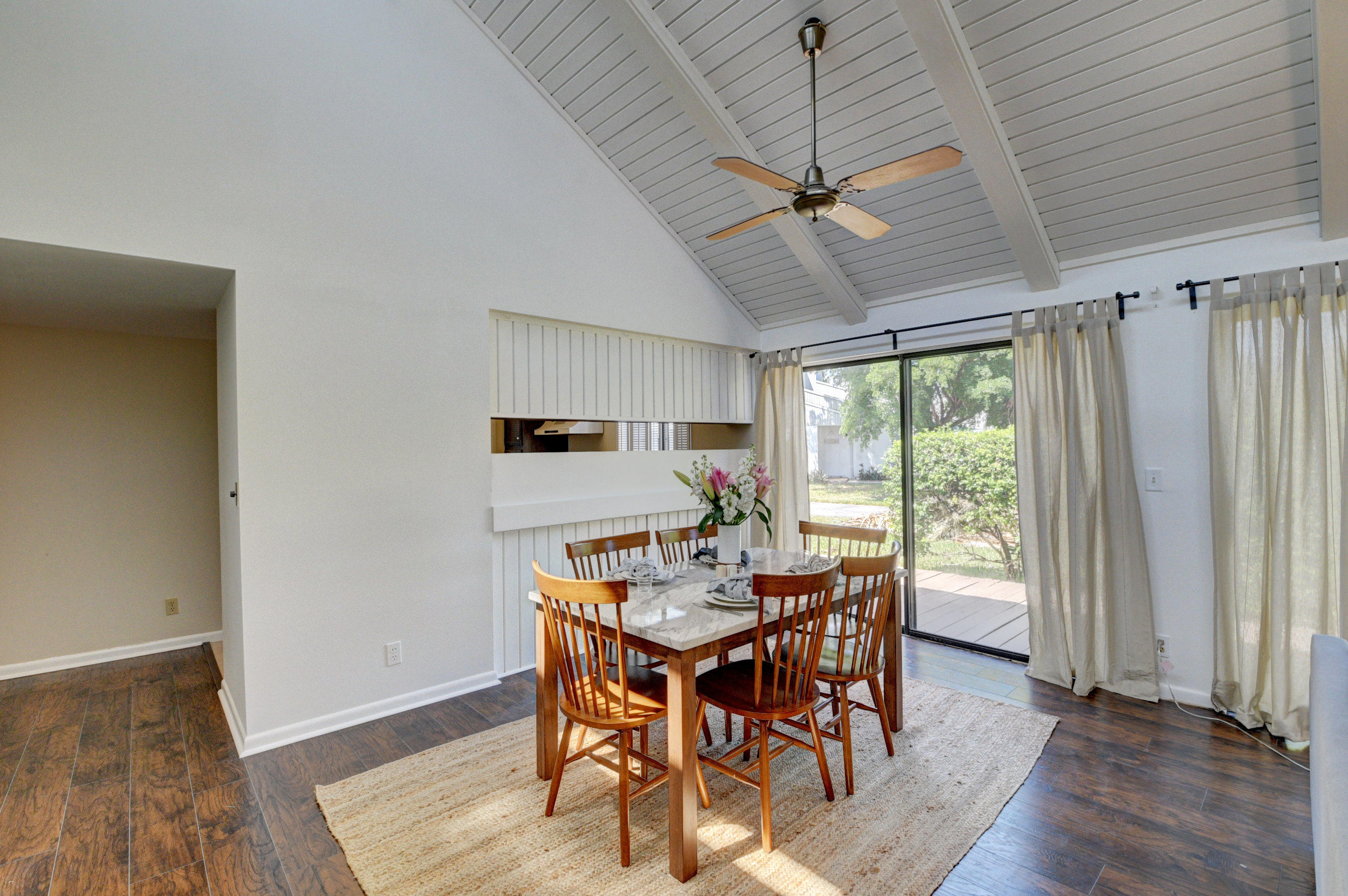 235 Northwest 15th Street Boca Raton, FL 33432 - Photo 9 of 32 a view of a dining room with furniture window and wooden floor
