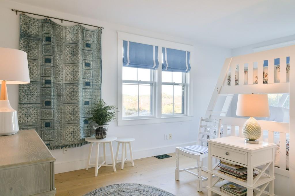 51 Madequecham Valley Road Nantucket, MA 02554 - Photo 18 of 25 a living room with furniture and a window