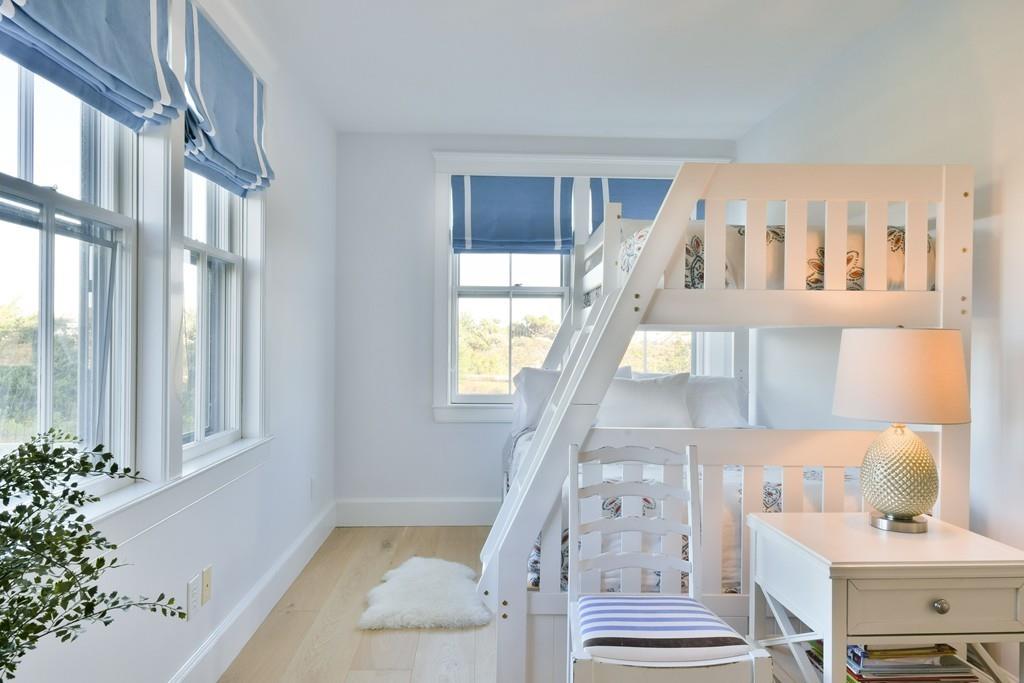 51 Madequecham Valley Road Nantucket, MA 02554 - Photo 20 of 25 a view of staircase with white walls