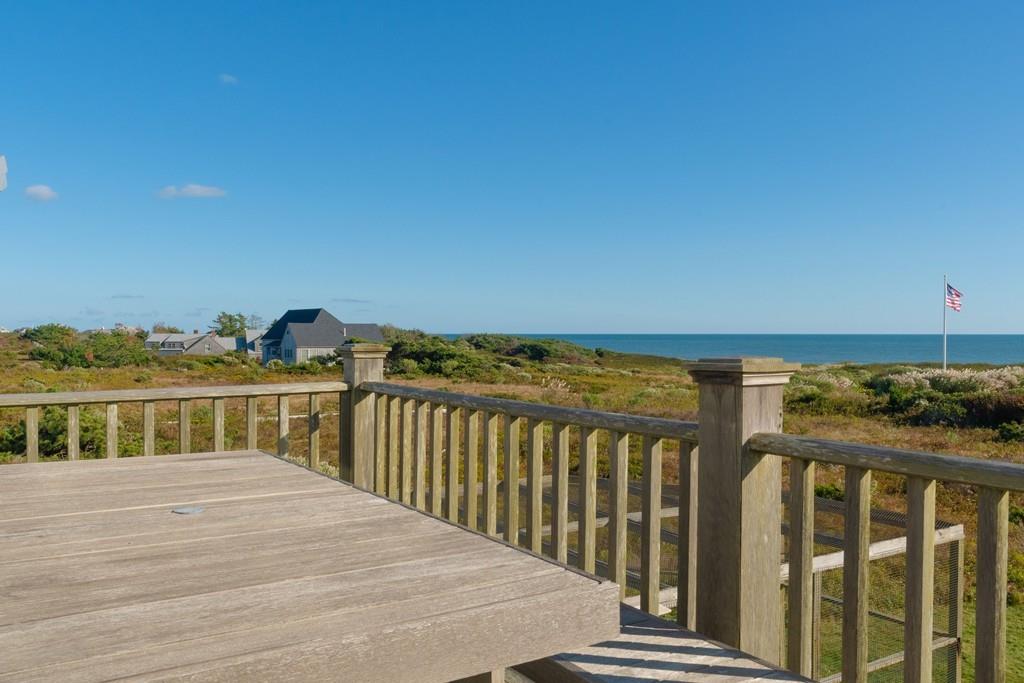 51 Madequecham Valley Road Nantucket, MA 02554 - Photo 23 of 25 a view of a balcony with wooden floor