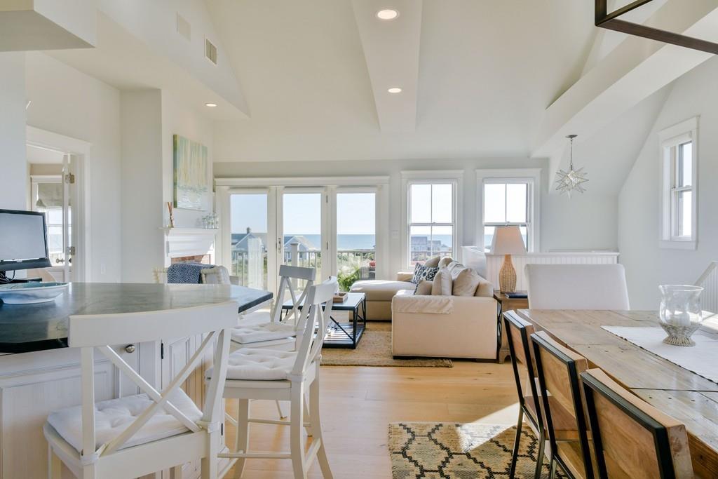 51 Madequecham Valley Road Nantucket, MA 02554 - Photo 6 of 25 a living room with furniture and a large window