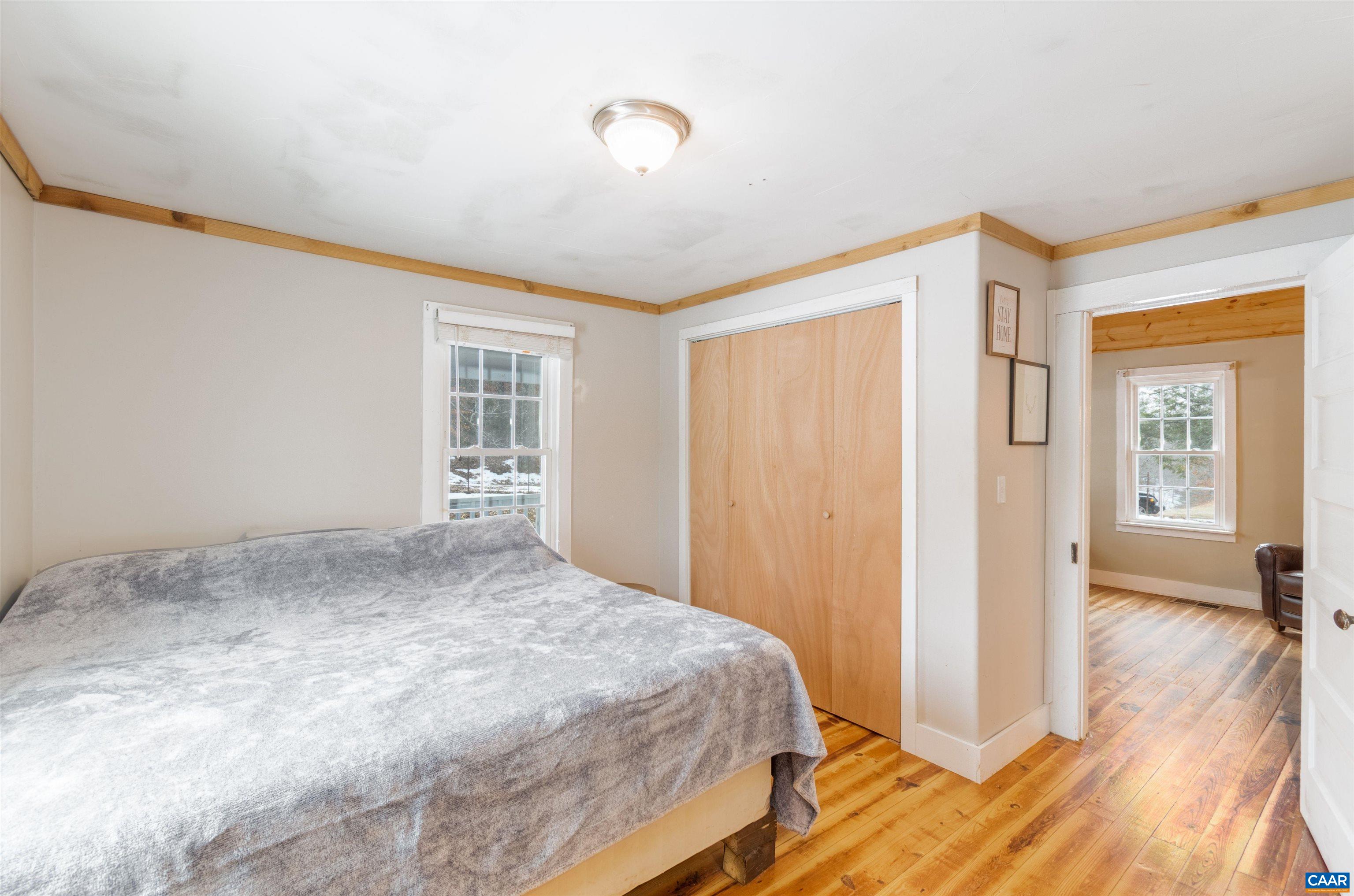 3626 Laurel Road Shipman, VA 22971 - Photo 4 of 36 a bedroom with a bed and a window