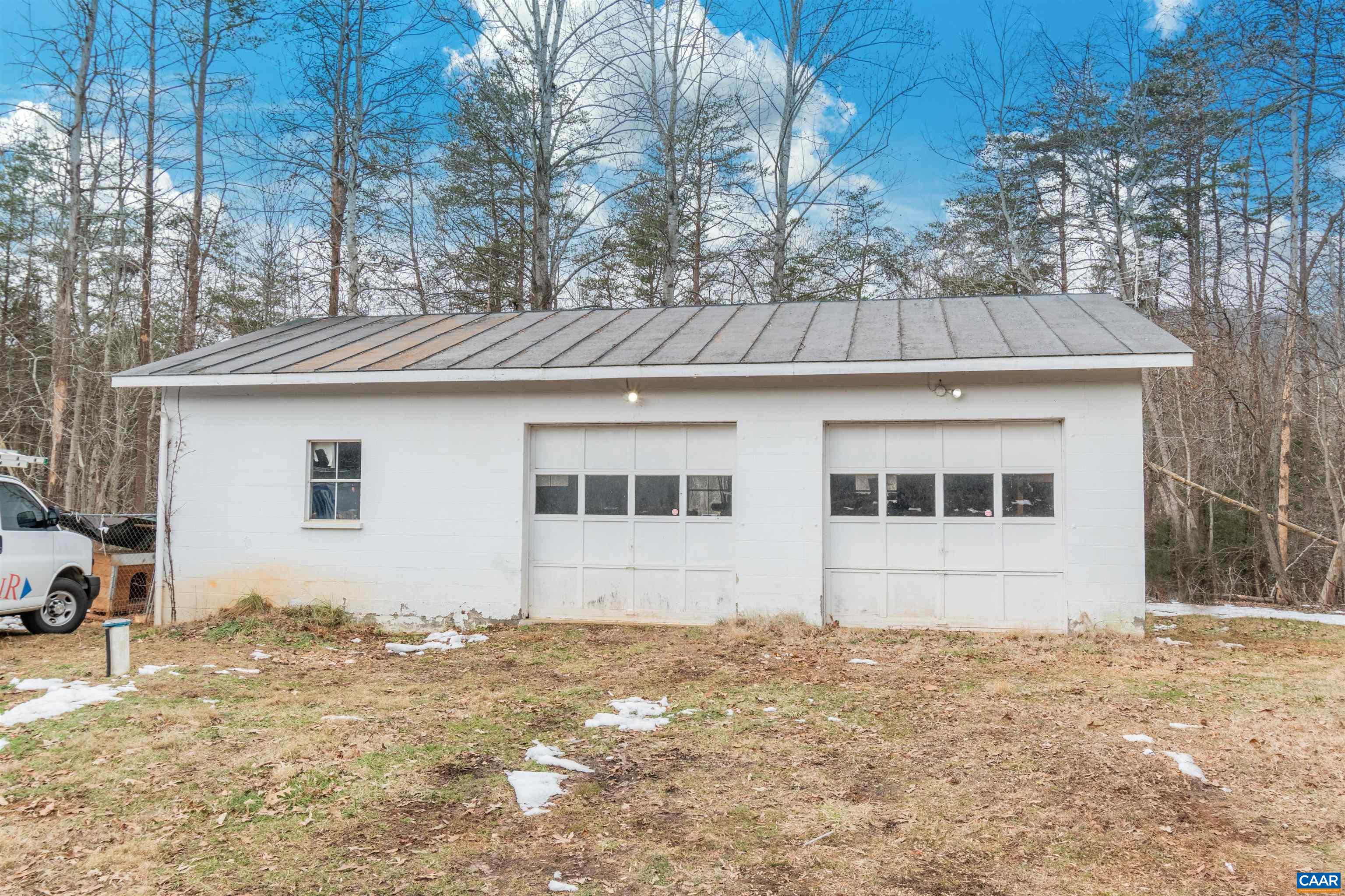 3626 Laurel Road Shipman, VA 22971 - Photo 7 of 36 a front view of a house with a yard