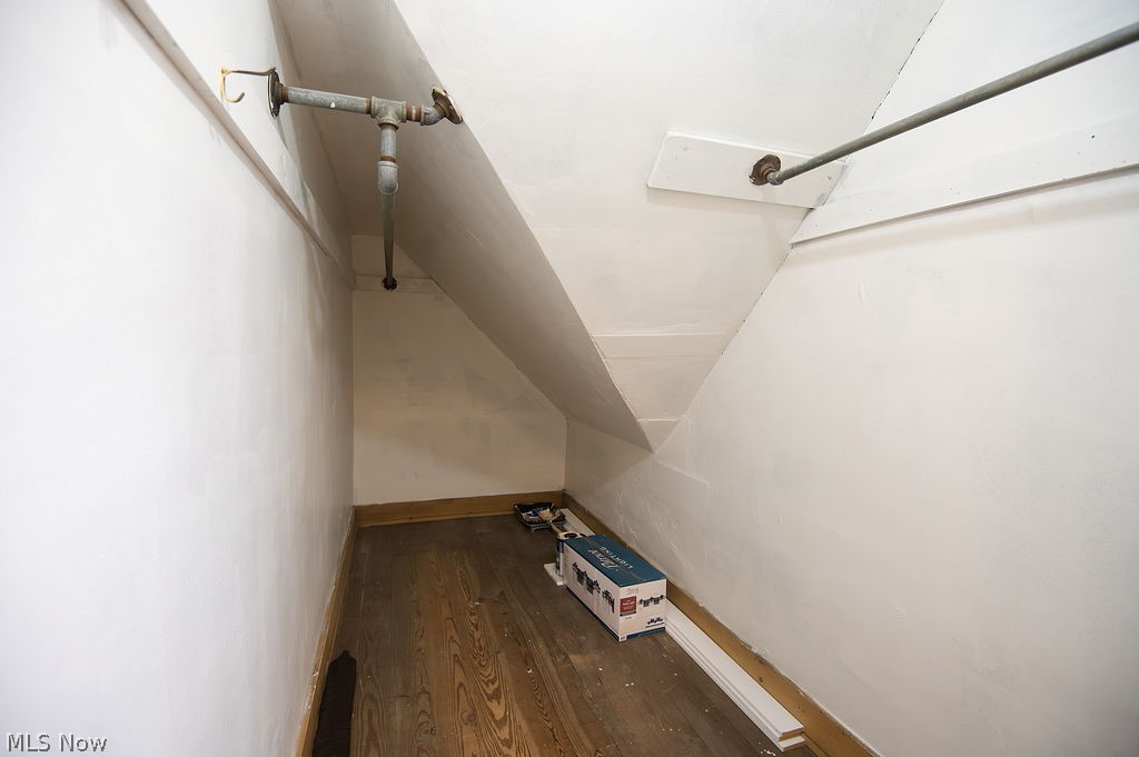 1195 South Johnson Road Sebring, OH 44672 - Photo 25 of 34 Walk in closet with dark wood finished floors