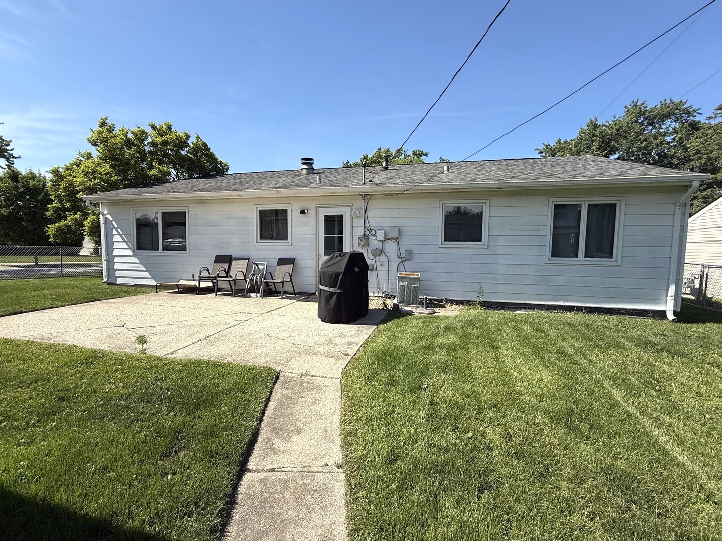 5199 Elmwood Road Oak Forest, IL 60452 - Photo 26 of 30 a view of a house with back yard
