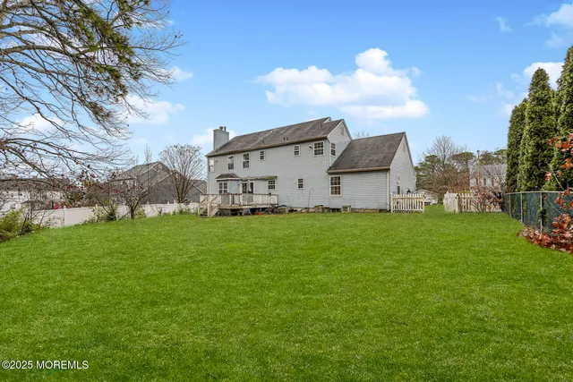 a view of a wooden deck with a bench