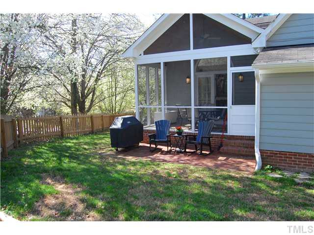 2 Swallows Ridge Court Durham, NC 27713 - Photo 18 of 25 The fenced backyard can be extended if you need more play space. It's perfect for this family. Patio/Deck