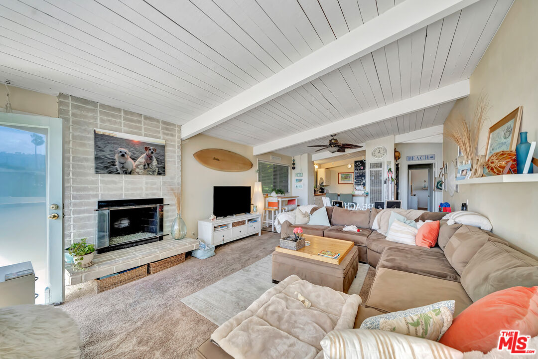110 Paseo De La Concha Redondo Beach, CA 90277 - Photo 5 of 14 a living room with furniture and a fireplace