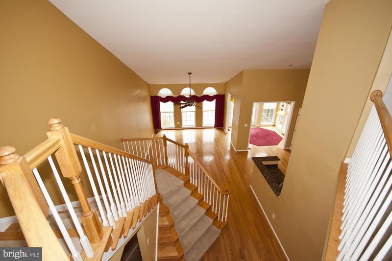 8603 Snowreath Road, Unit 8603 Baltimore, MD 21208 - Photo 26 of 30 a view of entryway and hall with wooden floor