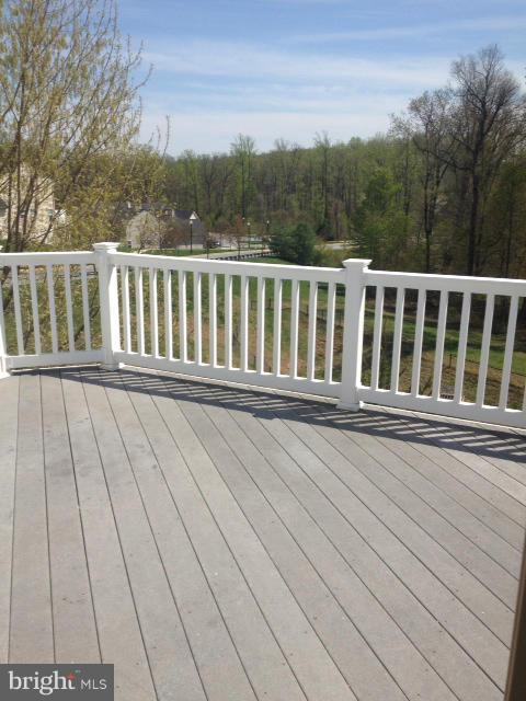 8603 Snowreath Road, Unit 8603 Baltimore, MD 21208 - Photo 30 of 30 a view of a wooden balcony