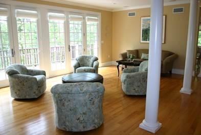 194 Fells Pond Road Mashpee, MA 02649 - Photo 10 of 34 a living room with furniture and a large window