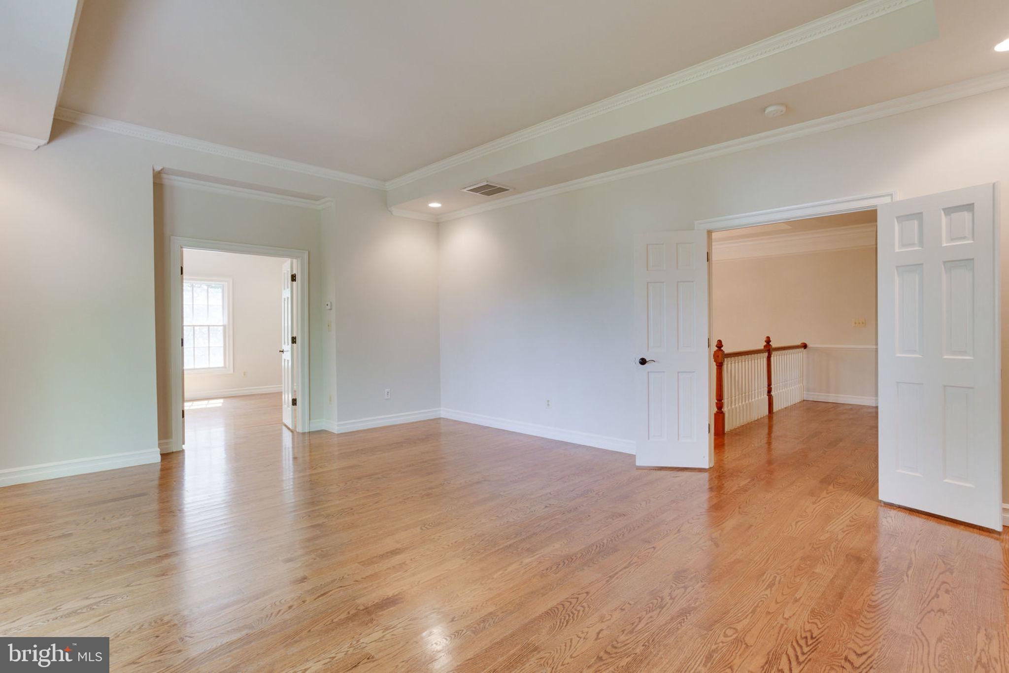 1843 Hunter Mill Road Vienna, VA 22182 - Photo 36 of 78 Tray ceiling, hardwoods, and recessed lights