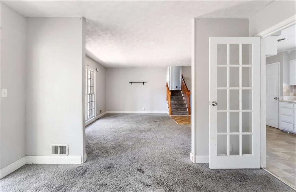 1999 Lindsey Lane Decatur, GA 30035 - Photo 13 of 38 an empty room with walk in closet and window