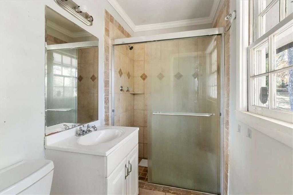 1999 Lindsey Lane Decatur, GA 30035 - Photo 18 of 38 a bathroom with a sink and mirror