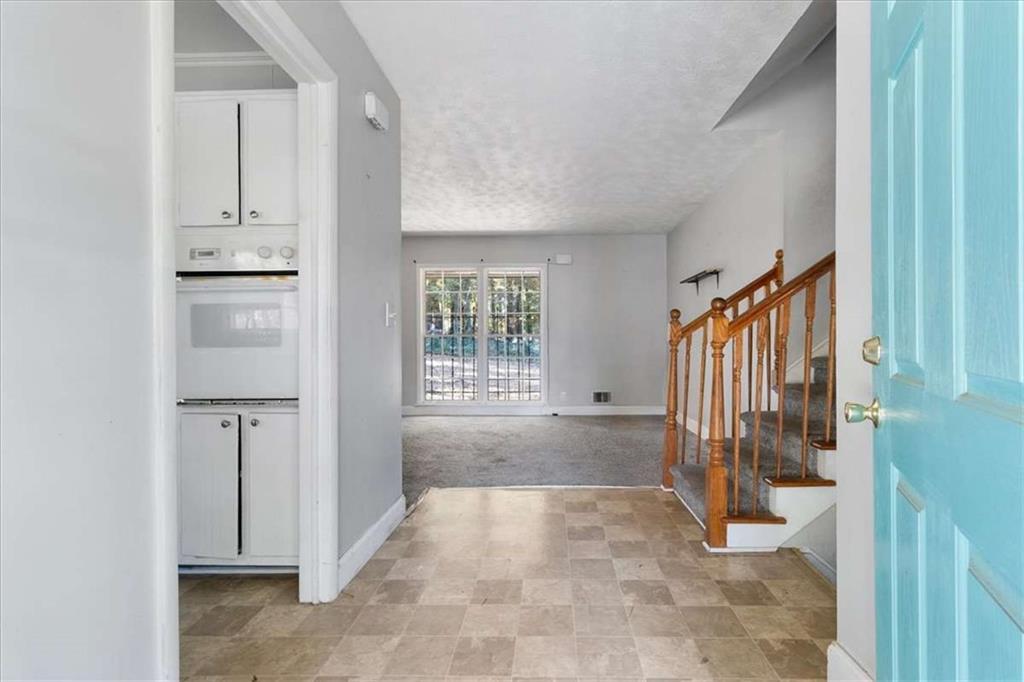 1999 Lindsey Lane Decatur, GA 30035 - Photo 4 of 38 a view of a bathroom with a sink and mirror