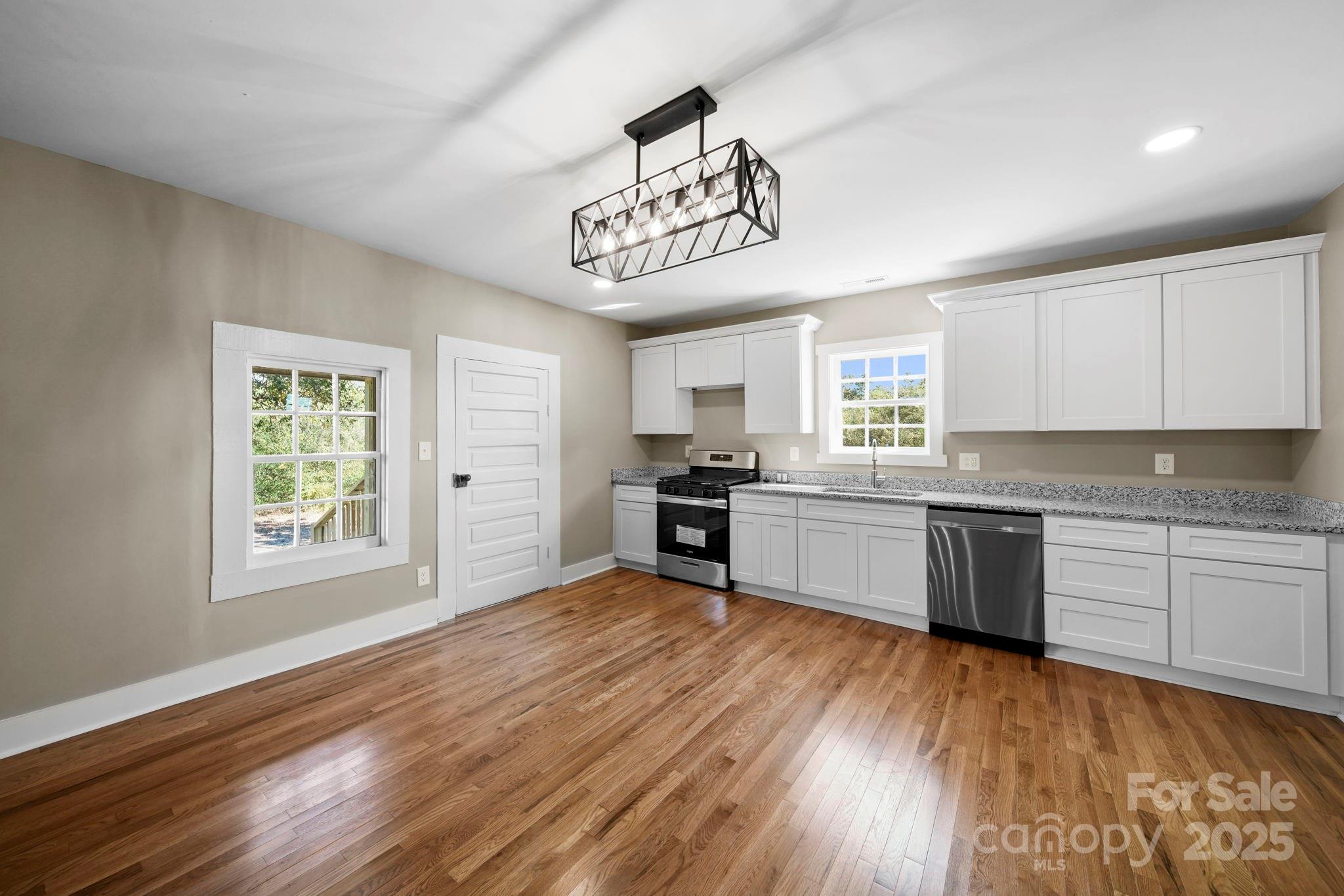 1048 Bowers Road Peachland, NC 28133 - Photo 14 of 44 a kitchen with a refrigerator and window