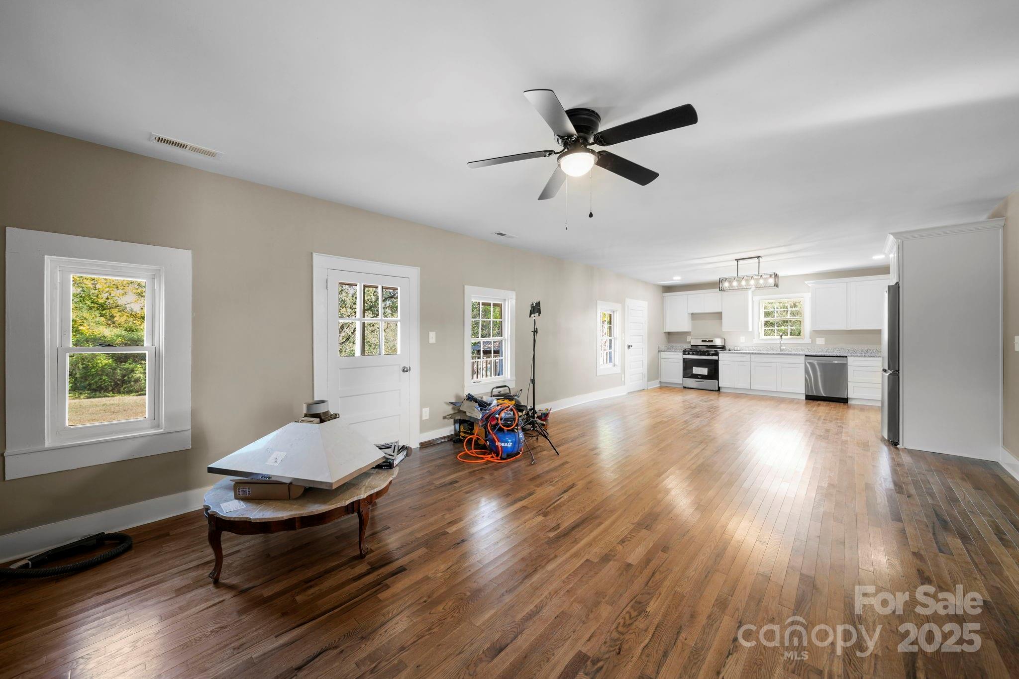 1048 Bowers Road Peachland, NC 28133 - Photo 18 of 44 a living room with furniture and a wooden floor