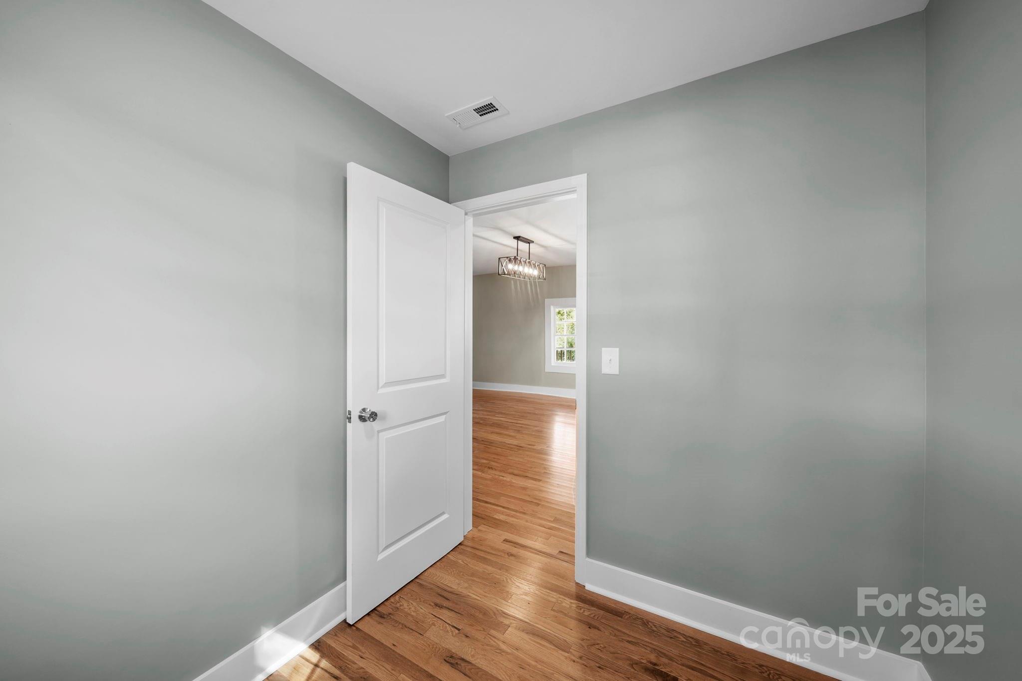 1048 Bowers Road Peachland, NC 28133 - Photo 20 of 44 a view of hallway with wooden floor