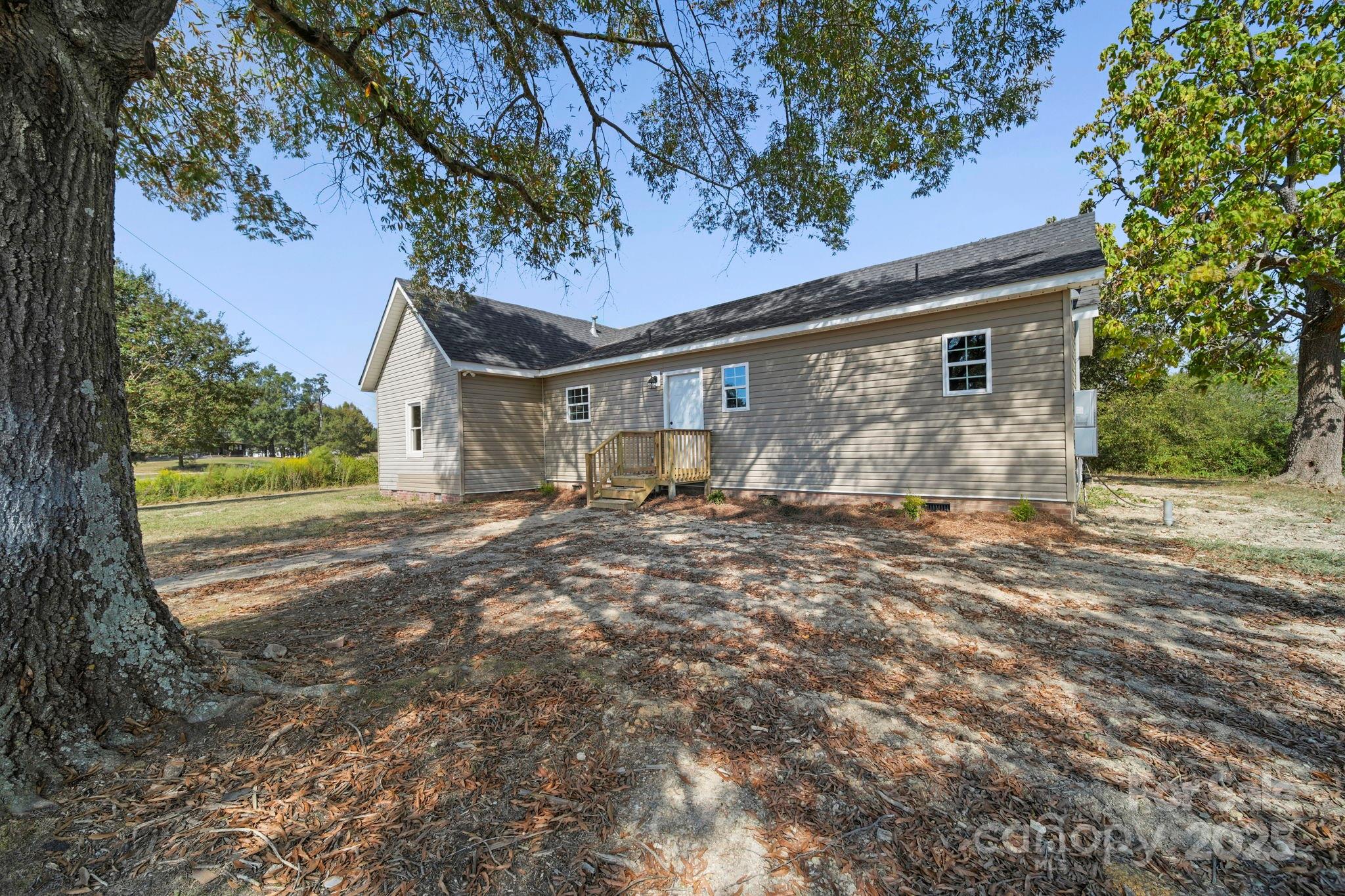 1048 Bowers Road Peachland, NC 28133 - Photo 2 of 44 a view of a house with a yard