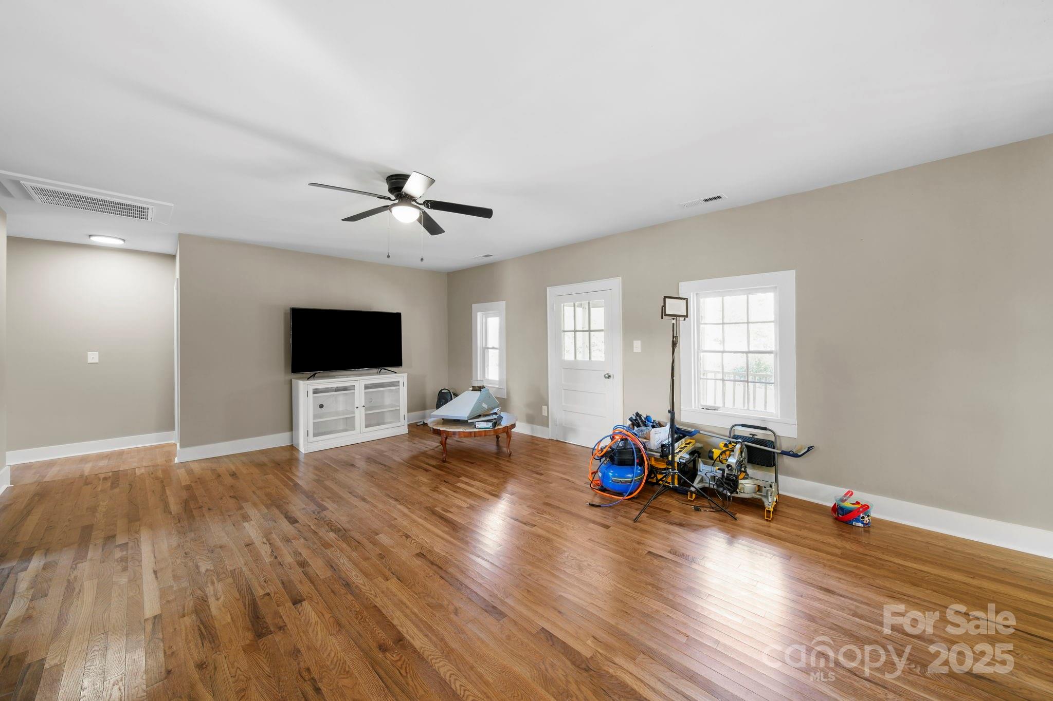 1048 Bowers Road Peachland, NC 28133 - Photo 23 of 44 a living room with furniture and a flat screen tv