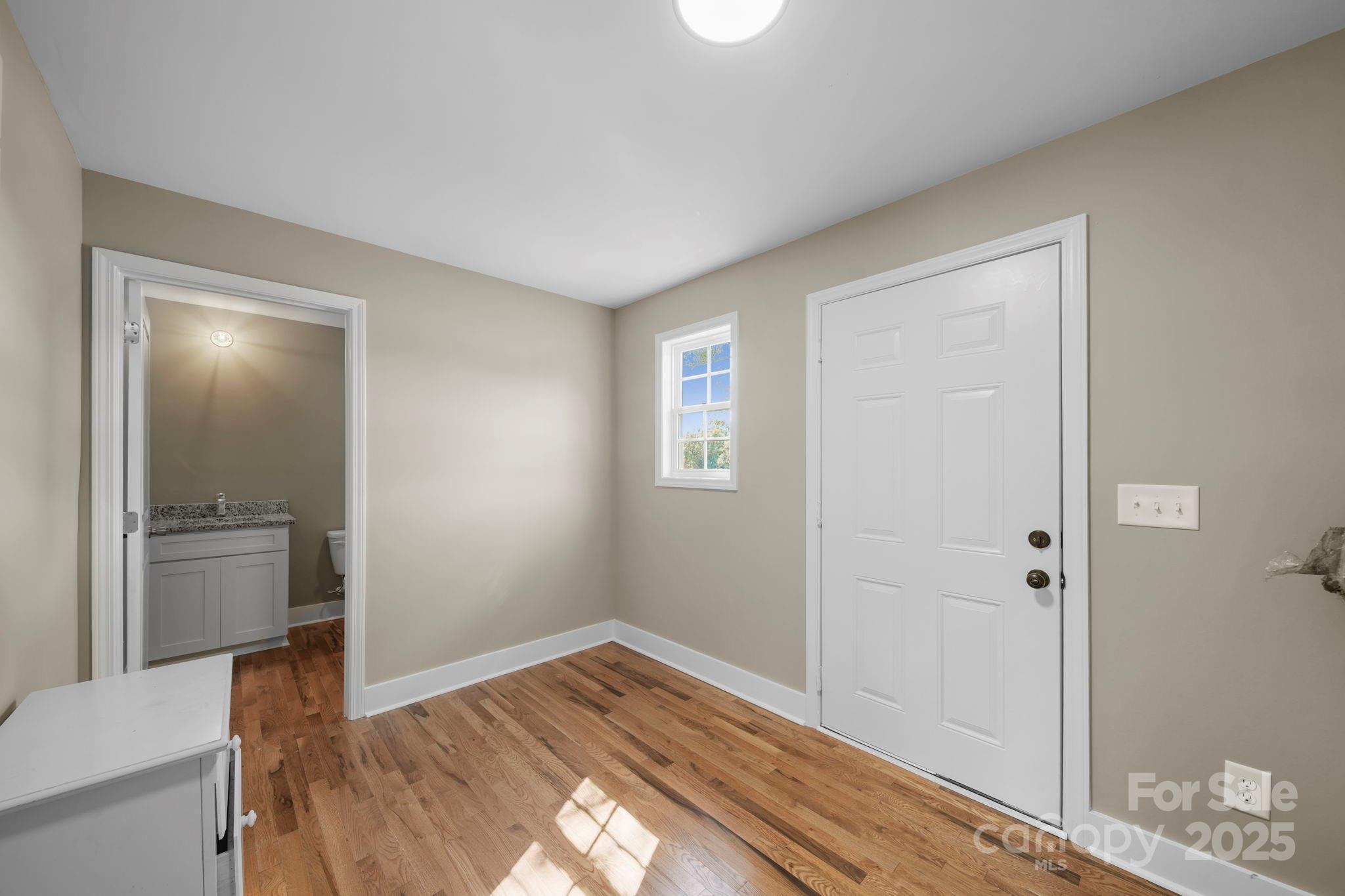 1048 Bowers Road Peachland, NC 28133 - Photo 24 of 44 a view of empty room with wooden floor