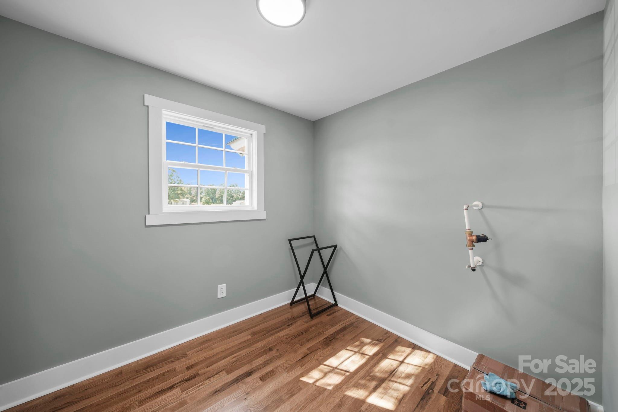 1048 Bowers Road Peachland, NC 28133 - Photo 29 of 44 a room with window and wooden floor