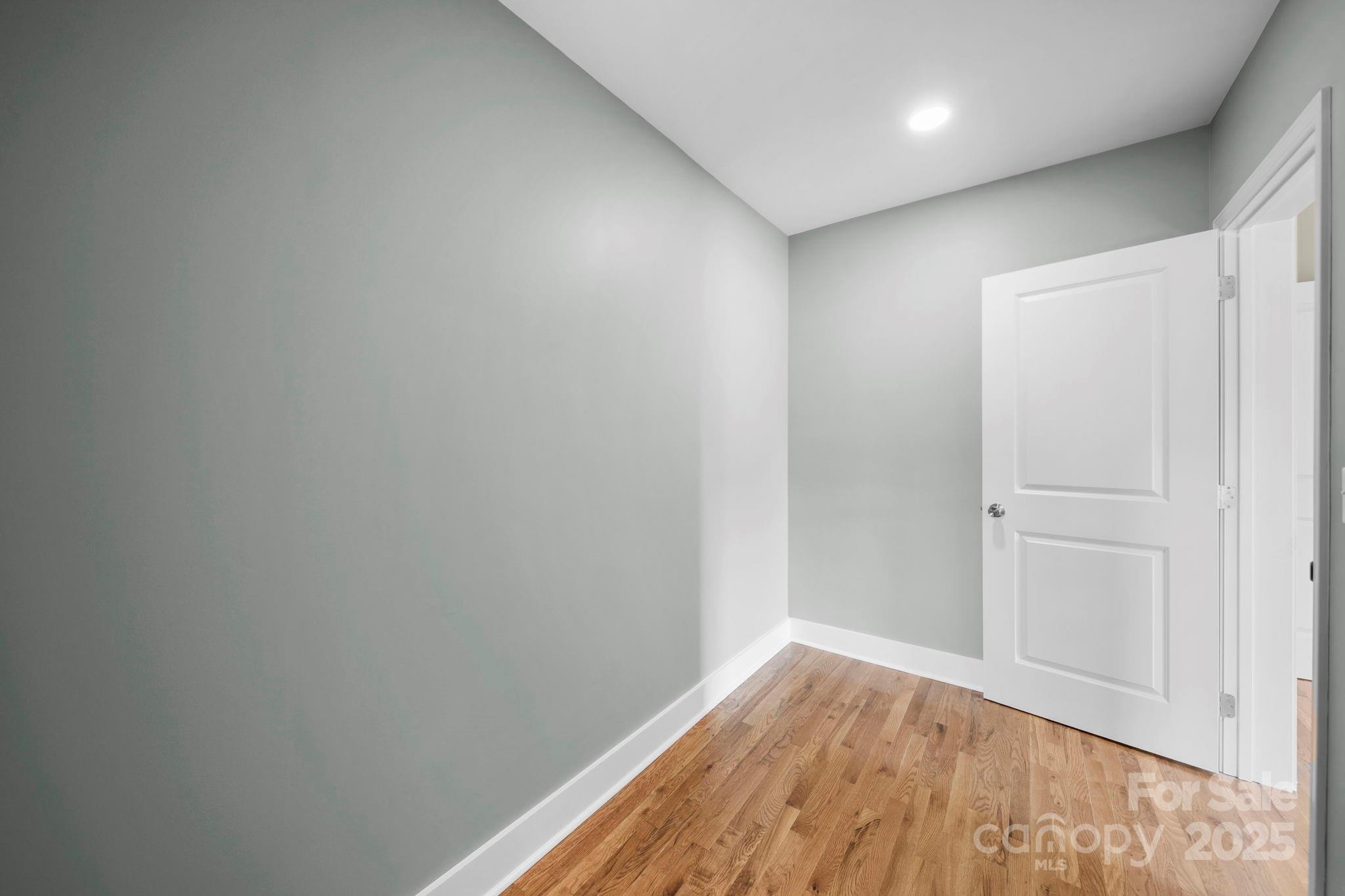1048 Bowers Road Peachland, NC 28133 - Photo 43 of 44 a view of a hallway with wooden floor