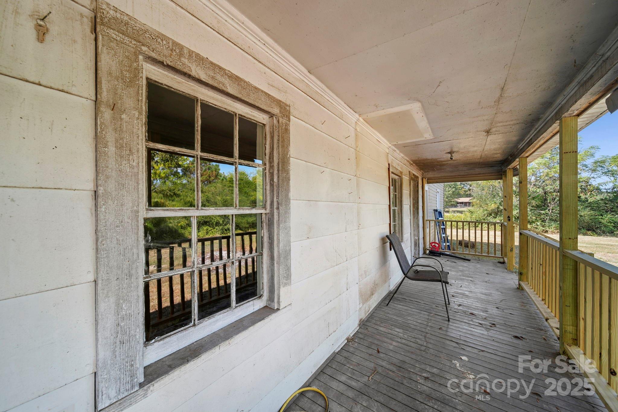 1048 Bowers Road Peachland, NC 28133 - Photo 8 of 44 a view of a balcony with wooden floor
