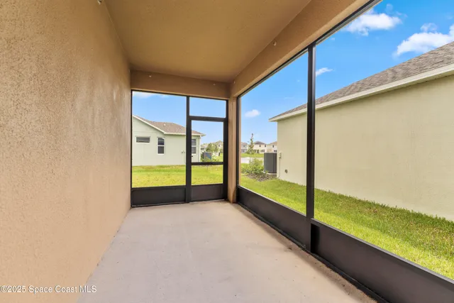 a view of an empty room with window