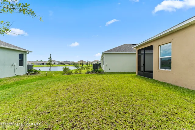 a front view of house with yard and seating