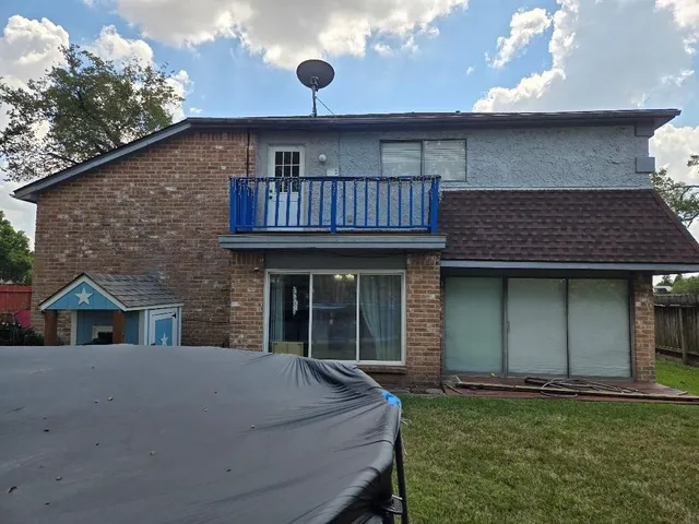 a house view with a garden space
