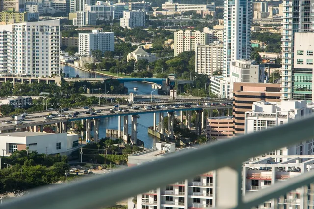 a view of a city with tall buildings