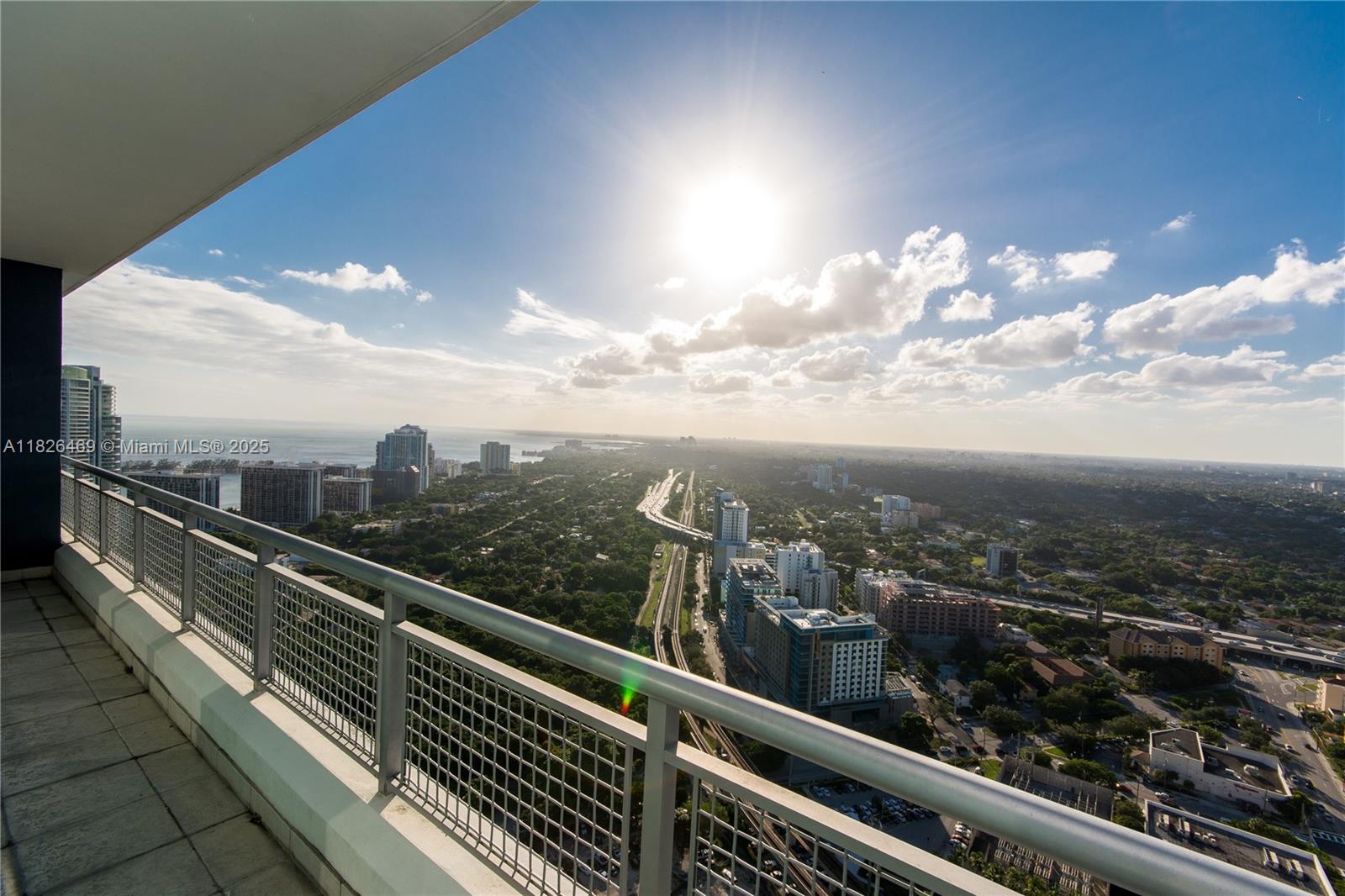 60 Southwest 13th Street, Unit 3805 Miami, FL 33130 - Photo 3 of 14 a view of city from a balcony