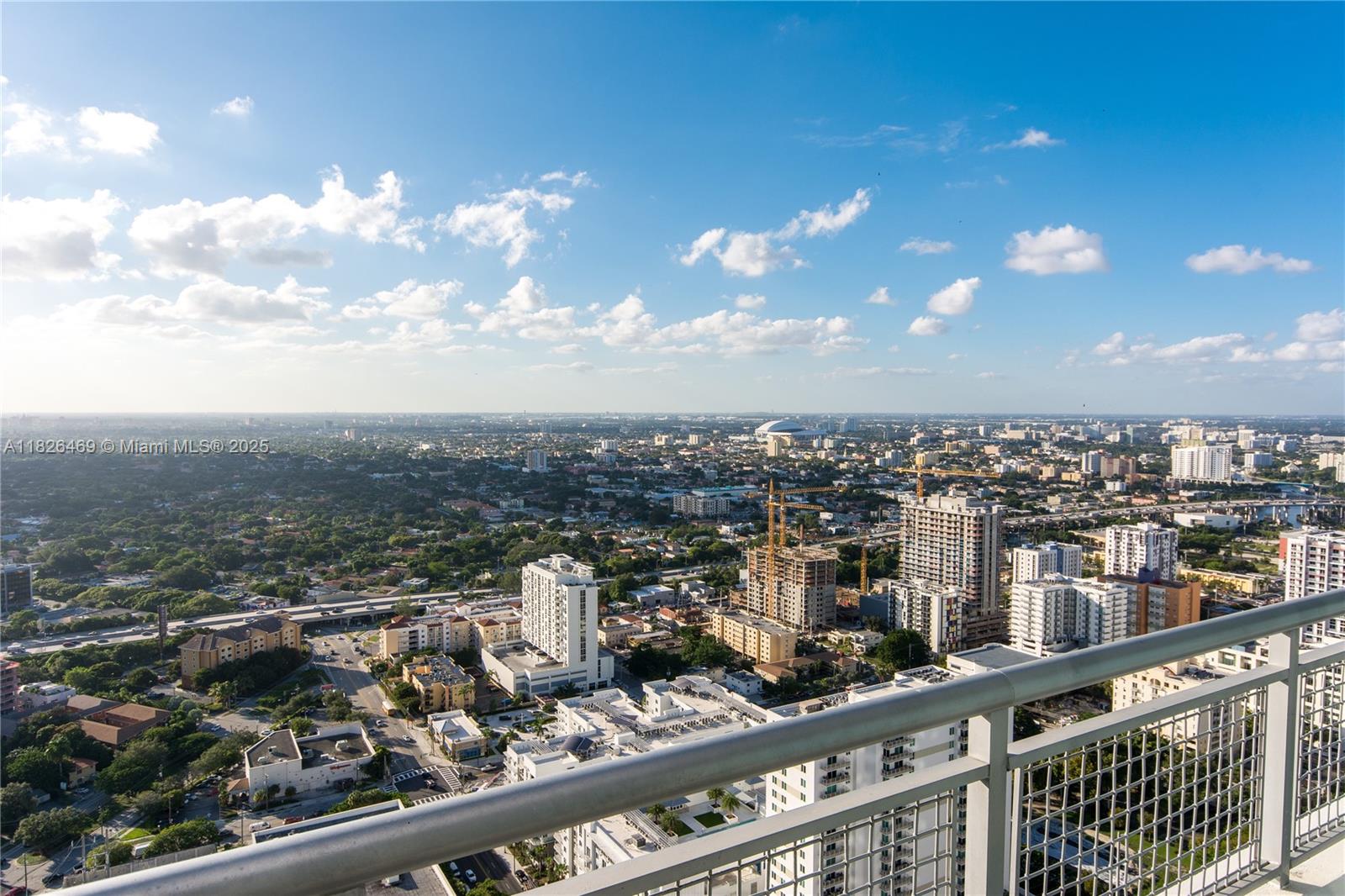 60 Southwest 13th Street, Unit 3805 Miami, FL 33130 - Photo 10 of 14 a view of a city from a balcony